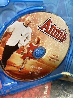 Annie two versions Albert Finney Carol Burnett, and Disney-image